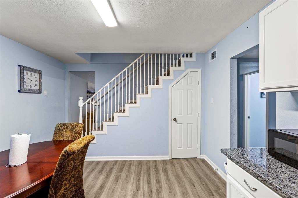 Pantry door and stairs to 2 bedrooms upstairs