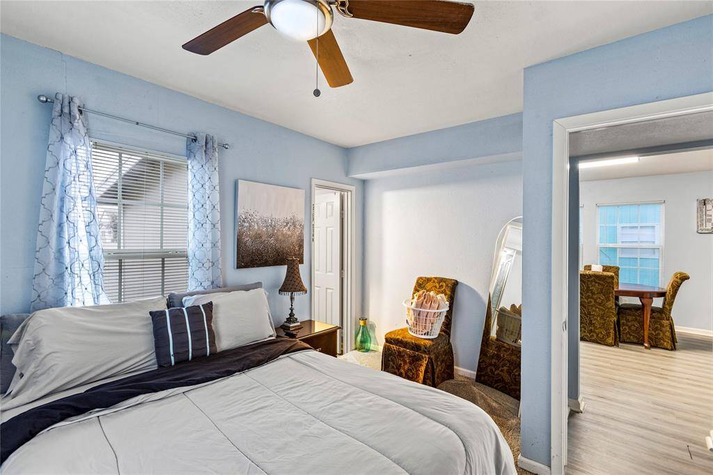 Primary bedroom with ensuite bathroom and walk in closet