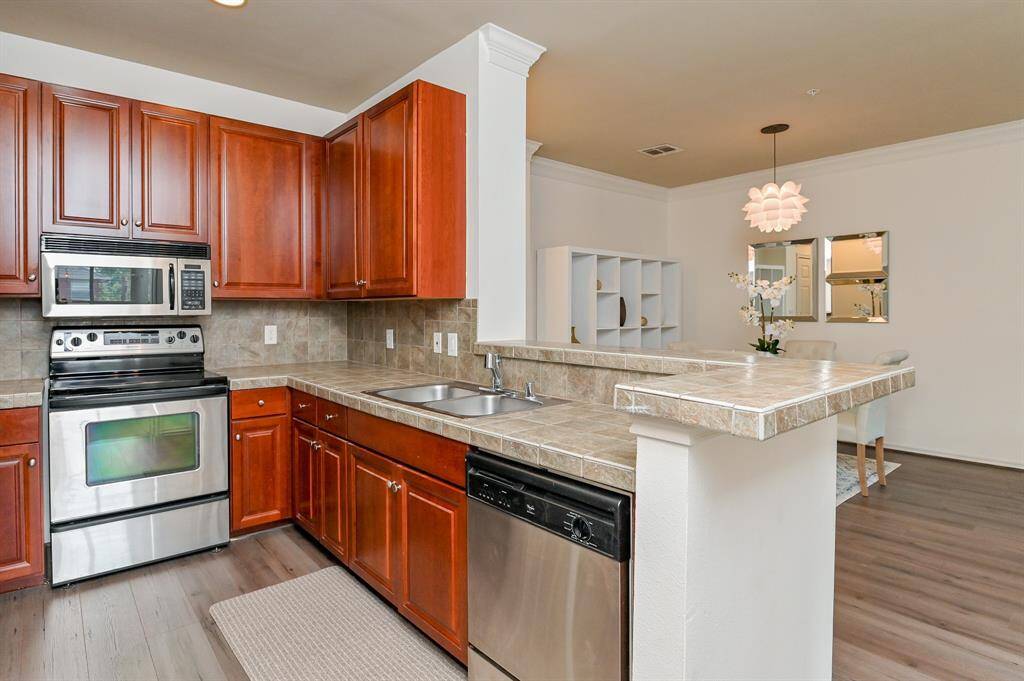 The custom kitchen creates the perfect opportunity to cook and entertain.