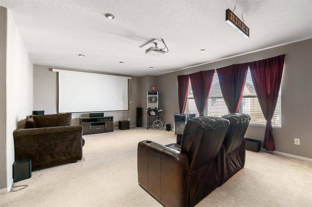 Game Room upstairs. Projector and screen convey with the home.