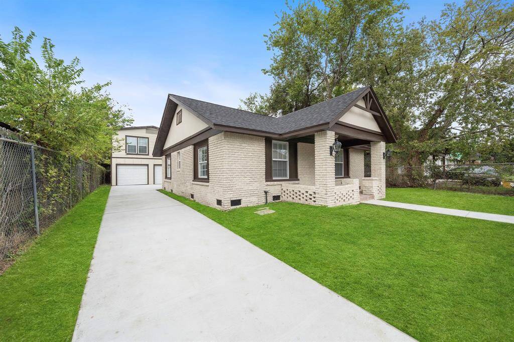 Front view of the left side of the home and driveway.