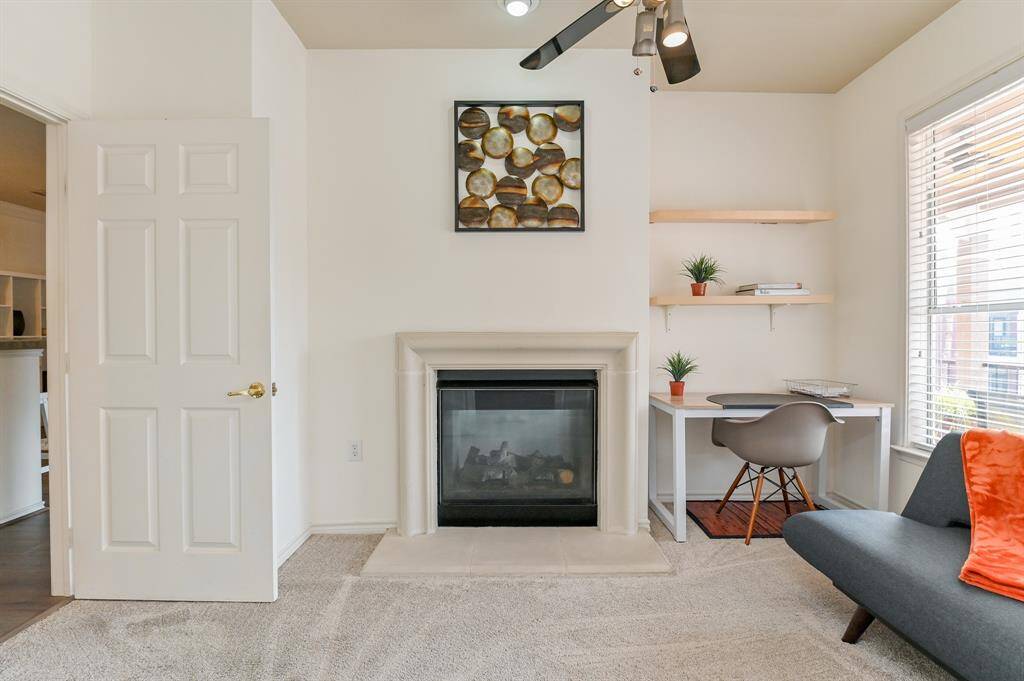 The study features a custom-made work station, a sofa bed for overnight guest and a fireplace for great ambience.