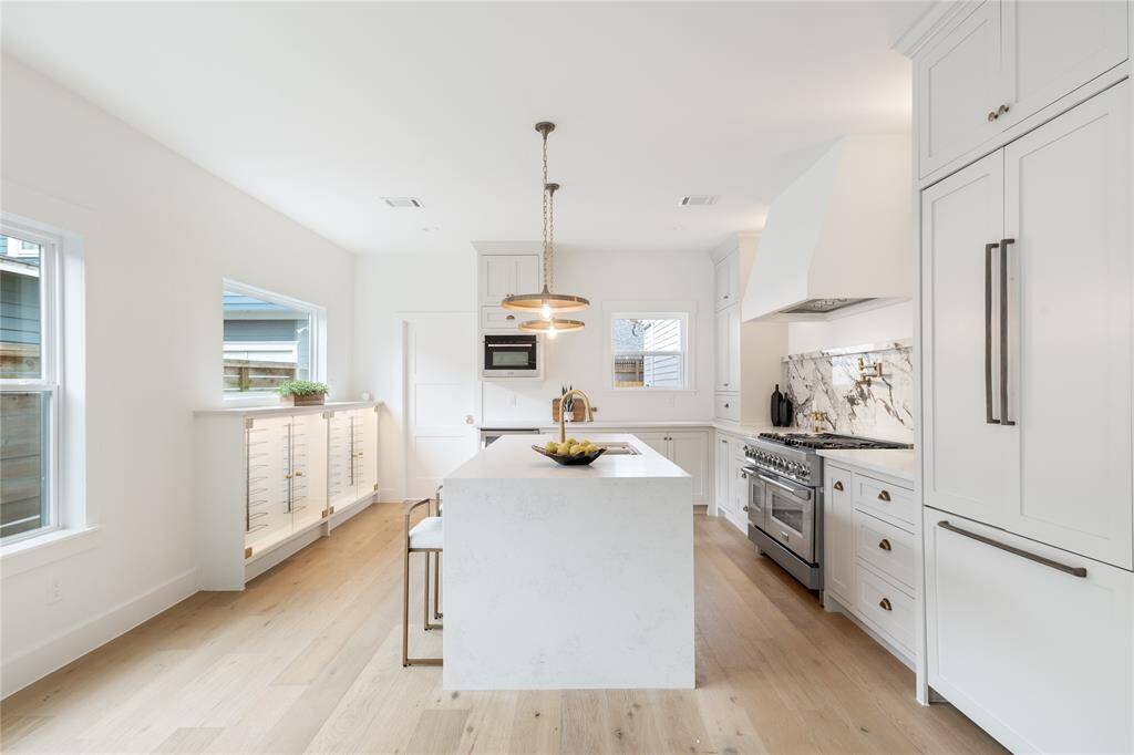 Entertain effortlessly in this open-concept kitchen featuring top-tier finishes and seamless flow to the dining and living areas.