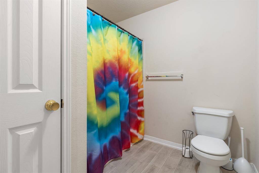 Large Secondary Bathroom upstairs with tub / shower combo.