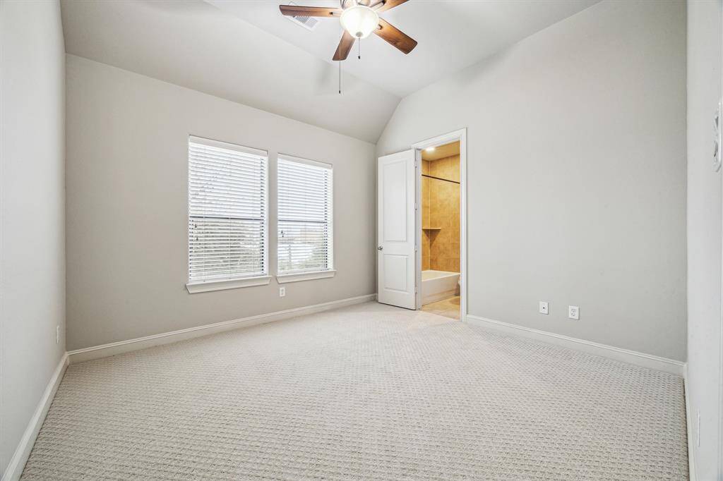 Additional bedroom on the third floor with private bath.
