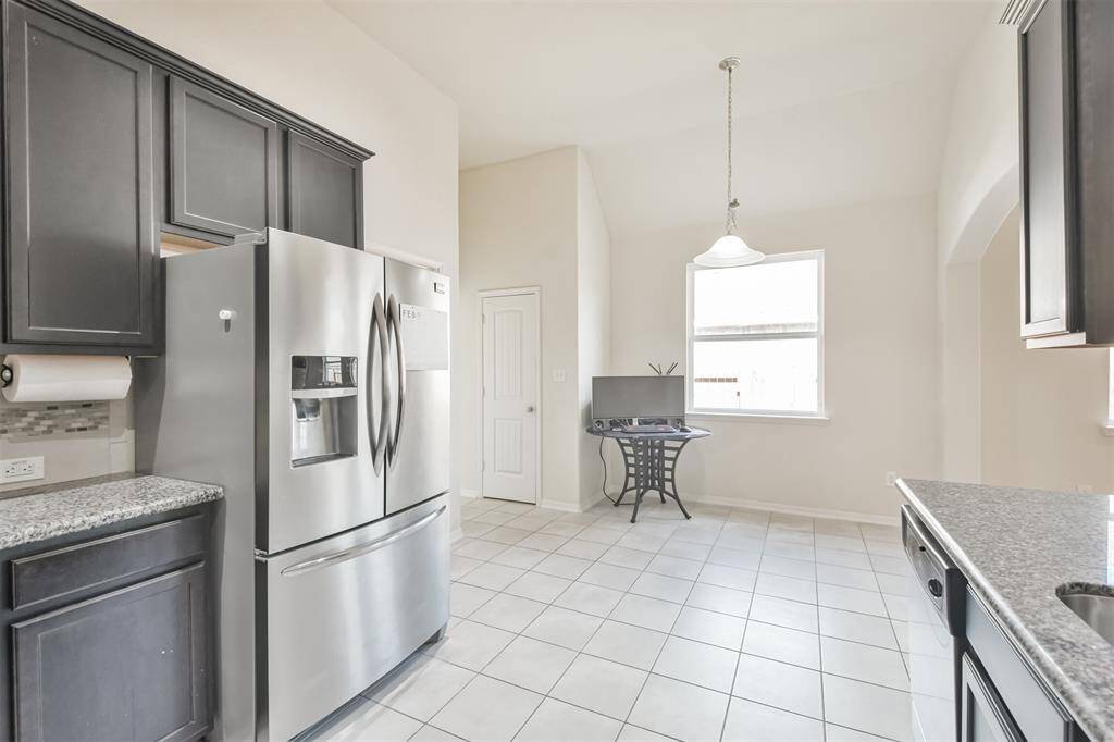 Refrigerator with a sleek stainless steel finish