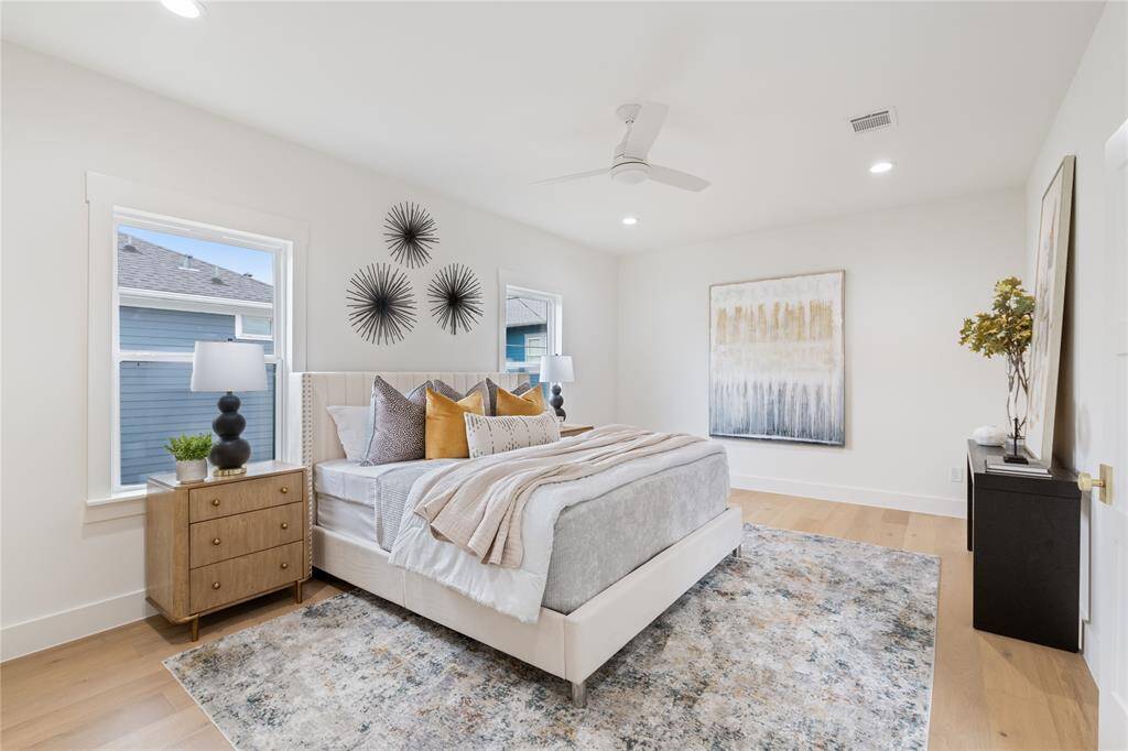 Indulge in luxury—this primary bedroom boasts sophisticated design, premium fixtures, and a tranquil atmosphere.