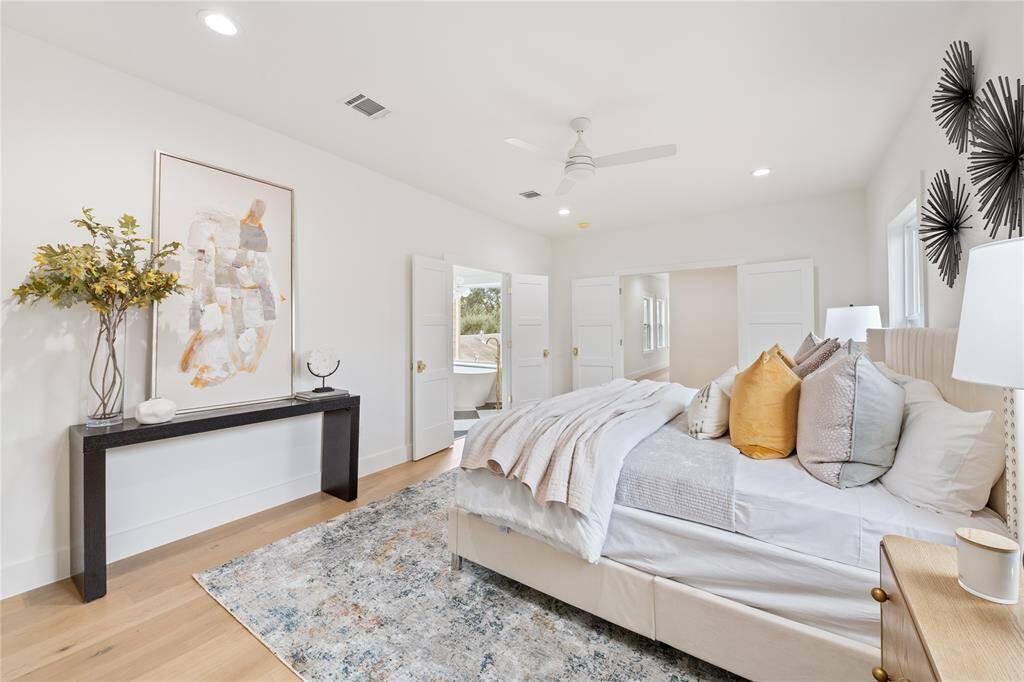 A private sanctuary with designer lighting, rich textures, and an airy feel—your perfect retreat at the end of the day.