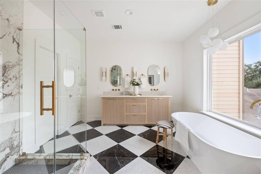 Fluted paneling, white oak double vanity.