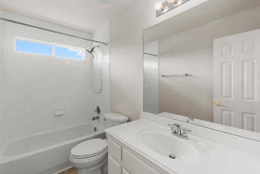 Large secondary bedroom with great windows, sloped ceilings and great closet space.