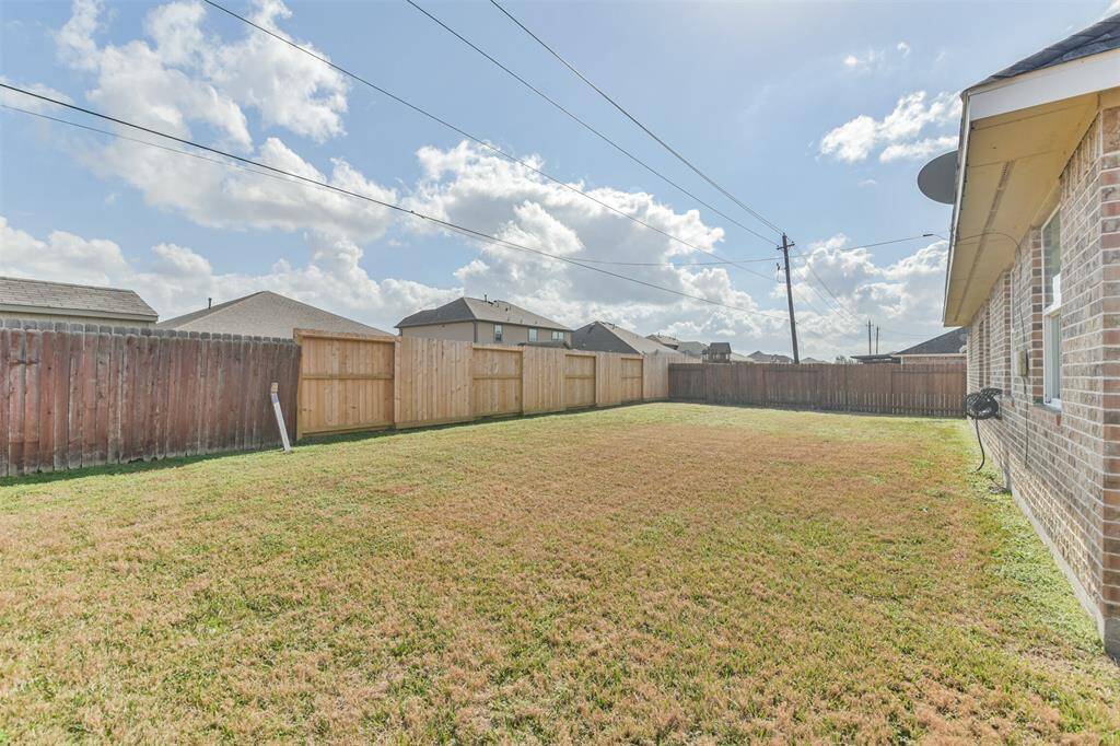 Spacious backyard, perfect for entertaining.