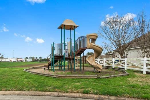 Community basketball court and tables for family get togethers and picnics.