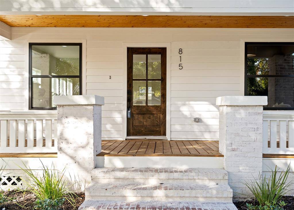 Staying true to the heights bungalow style that we all know and love, the builder preserved the original front porch & brick columns.