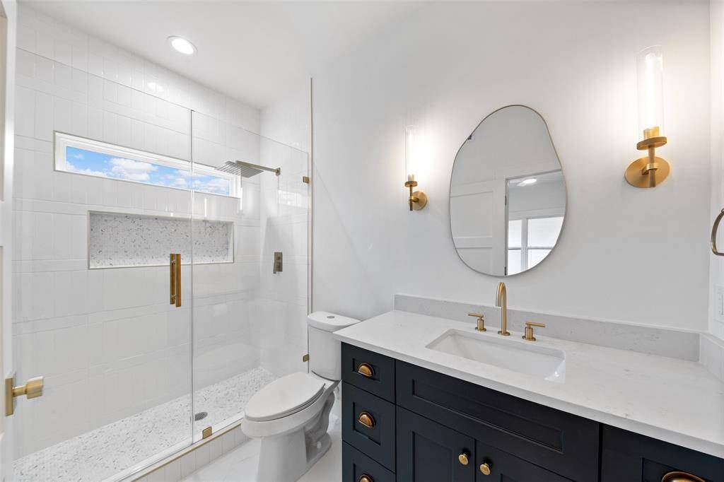 Private and elegant—each en-suite bath offers a custom vanity, designer lighting, and carefully curated details for a luxurious feel.