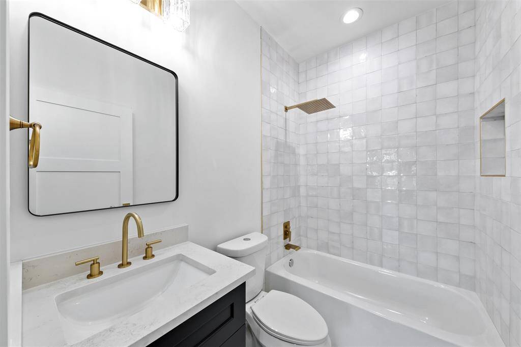 No detail overlooked—each secondary bathroom is a blend of function and beauty, perfectly complementing its attached bedroom.