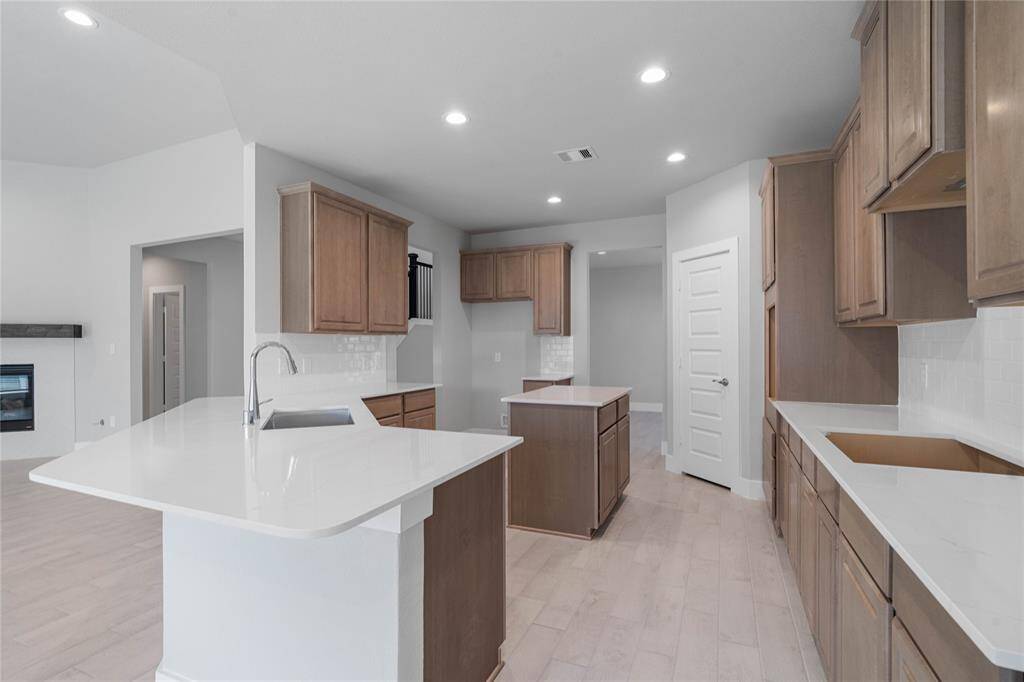 This photo is for illustrative purposes only and is not to be considered an exact replica of the finished home. Rendering does not match the finished product in terms of features, colors, landscaping, etc. Pricing, specifications, square footage and materials are subject to change at any time and without notice.