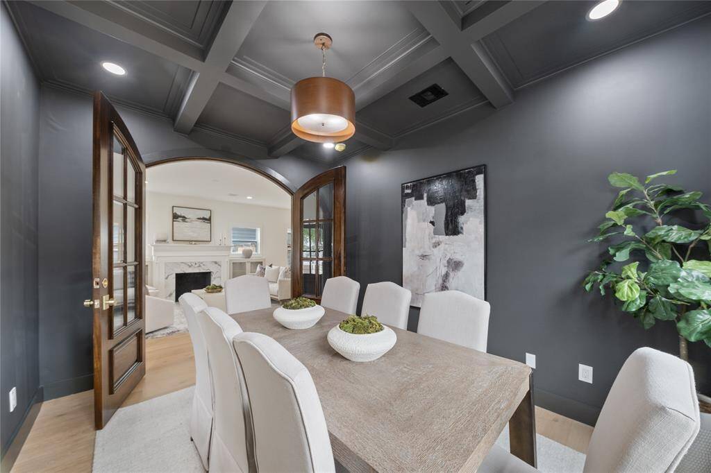 An inviting dining area with custom millwork, timeless finishes, and a perfect flow for hosting unforgettable gatherings.