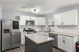 Another view of the kitchen.