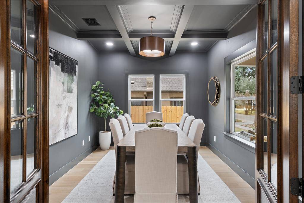 Custom on site coffered ceiling in the dining room. This room can also be converted to a study or office if desired.