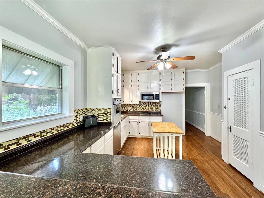 Large kitchen area with space for a breakfast bar