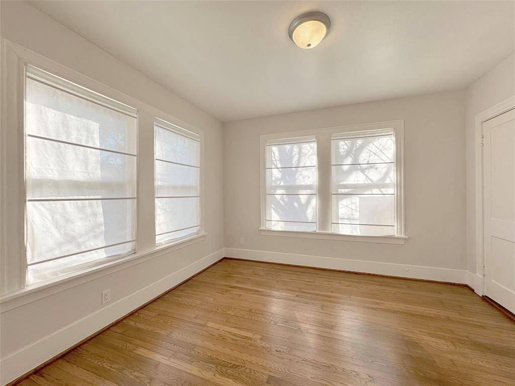 The Bedroom is quite spacious for bed and side pieces.