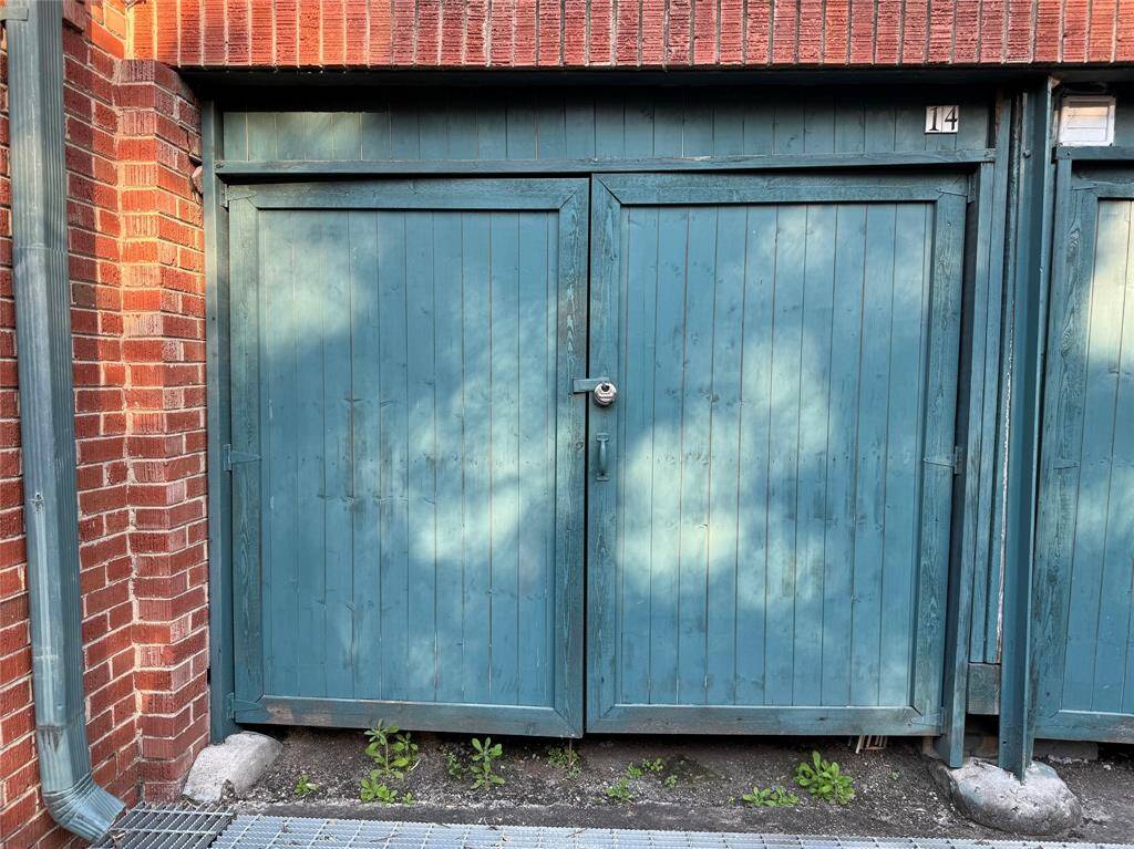 There are storage units  that surround the building complex at ground level.