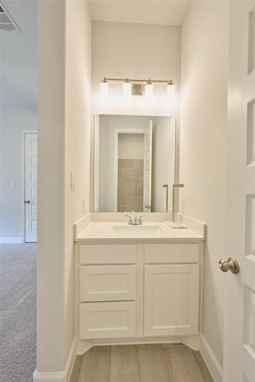 Bedroom 4 offers a separate vanity and bath for the family member or guest who may want their own 'apartment-like' feel at 136 Hushed Nightfall.