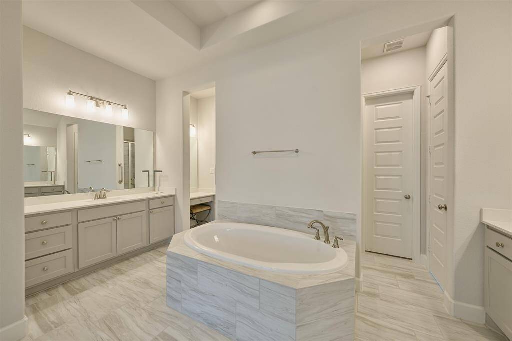 His/Hers vanities, His/Hers closets...With elevated details at 136 Hushed Nightfall.