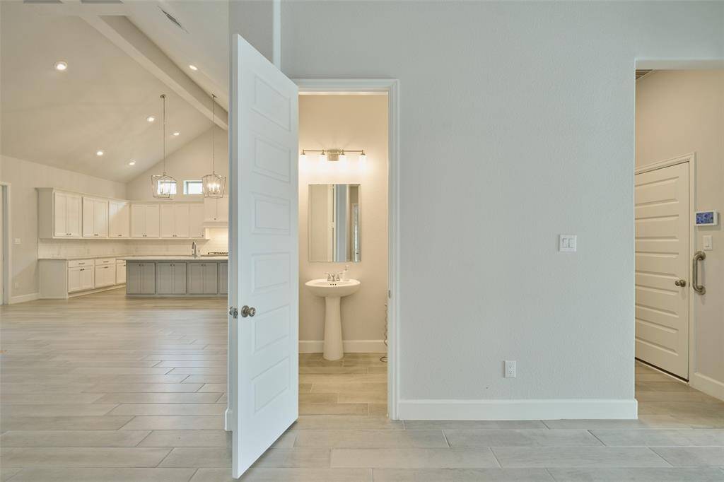 Roomy 'guest vanity' is private and convenient for visiting guests