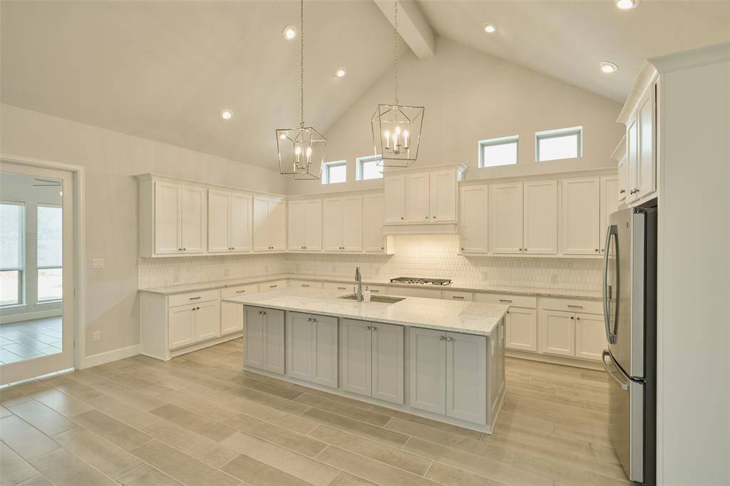 Refrigerator transfers with accepted contract.  View from the fireplace wall at 136 Hushed Nightfall.