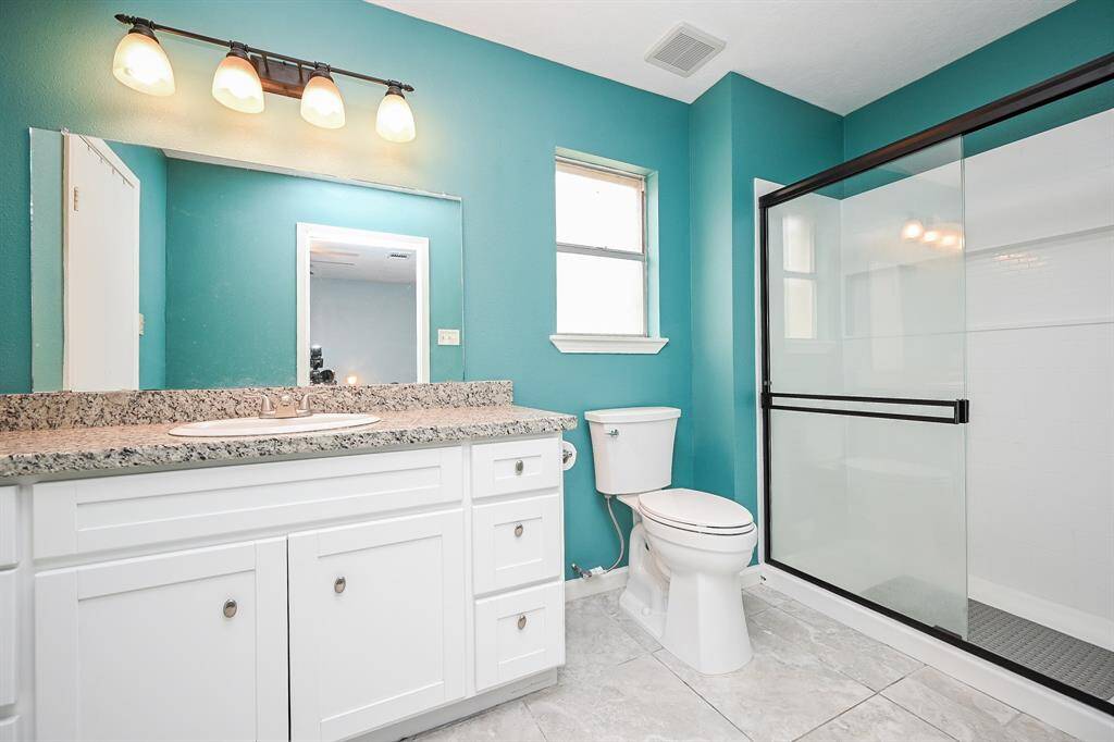 The Primary Bedroom has an En-Suite Bath with Shower and Walk-In Closet.