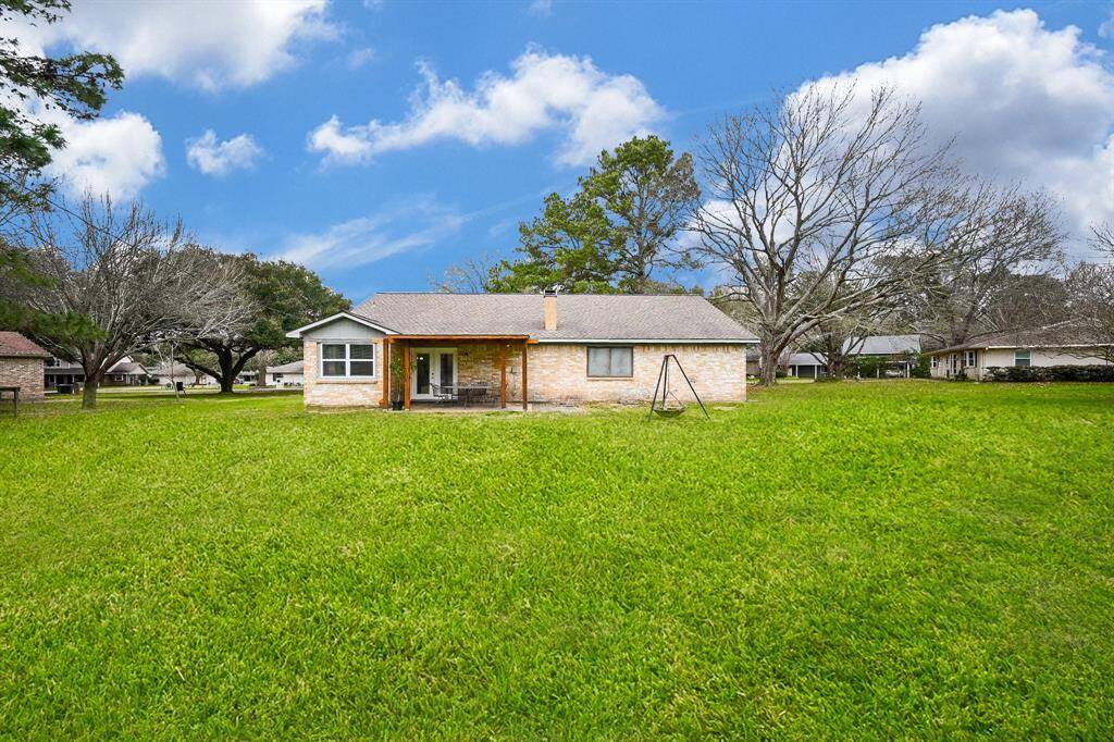 Back Yard View for this Classic 1-Story Home on approx. .75 Acres. Cul-de-Sac Street. Space for a Future Pool, Garden, Pets & Recreation.