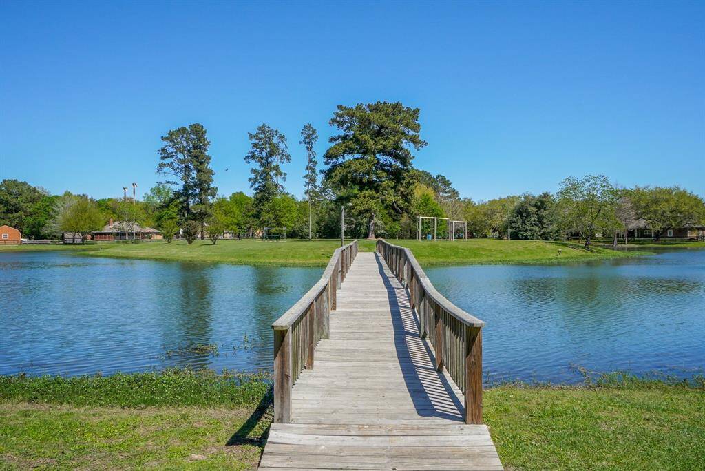 Beautiful Neighborhood Lake with Island. Enjoy Watching the Kids Play on the Swings and Playground Equipment and have a Picnic at the Picnic Tables. Catch and Release Fishing. Don't Forget to Feed the Ducks!