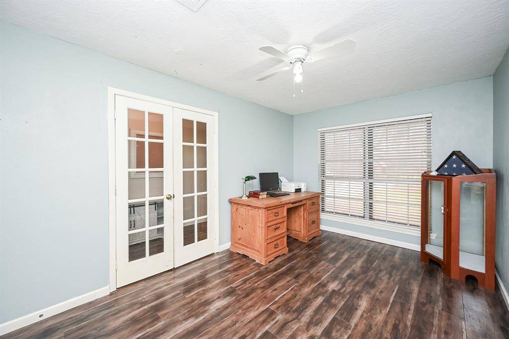Home Office (Flex Room) could be a 4th Bedroom, Dining Area, Play Room, Game Room, etc. It has a Large Walk-In Closet and a Door to the Back Hallway where the Full Bath and other Bedroom are located.