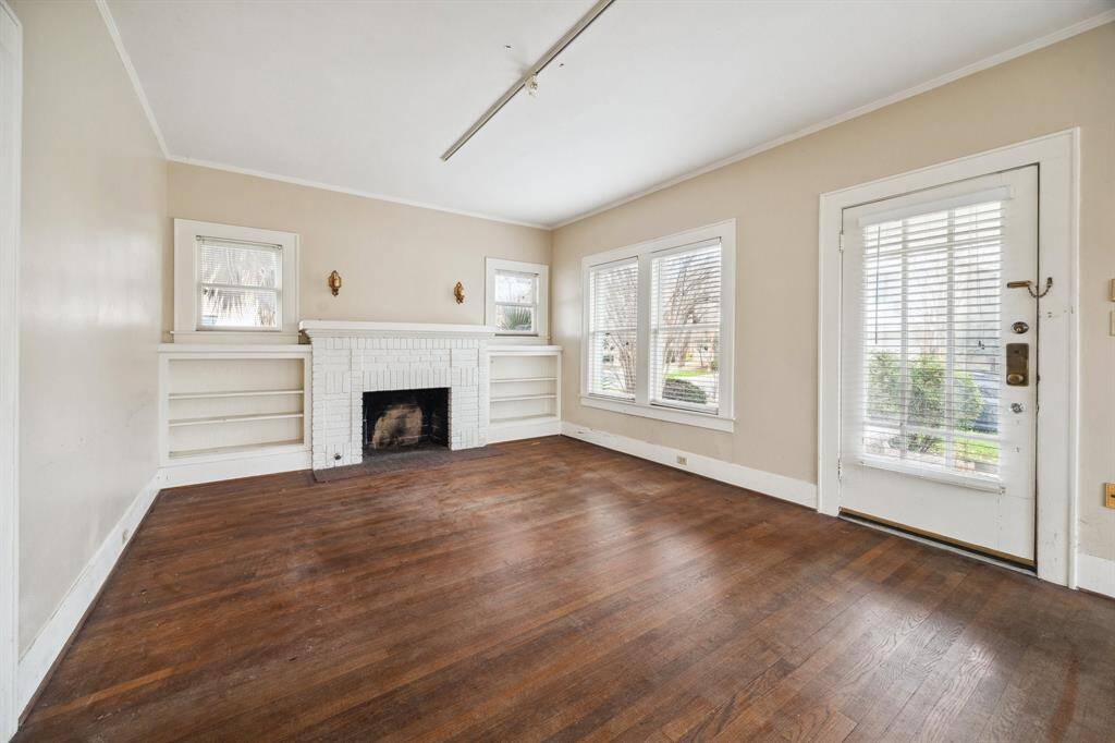 Living Room with the original fireplace.
