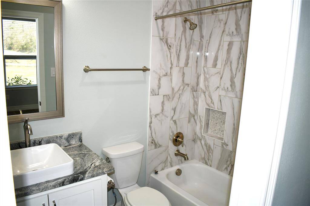 Full en-suite convenience for Bedroom Four.