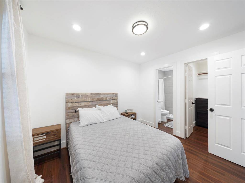 The primary bedroom features a walk-in closet and en-suite bathroom.