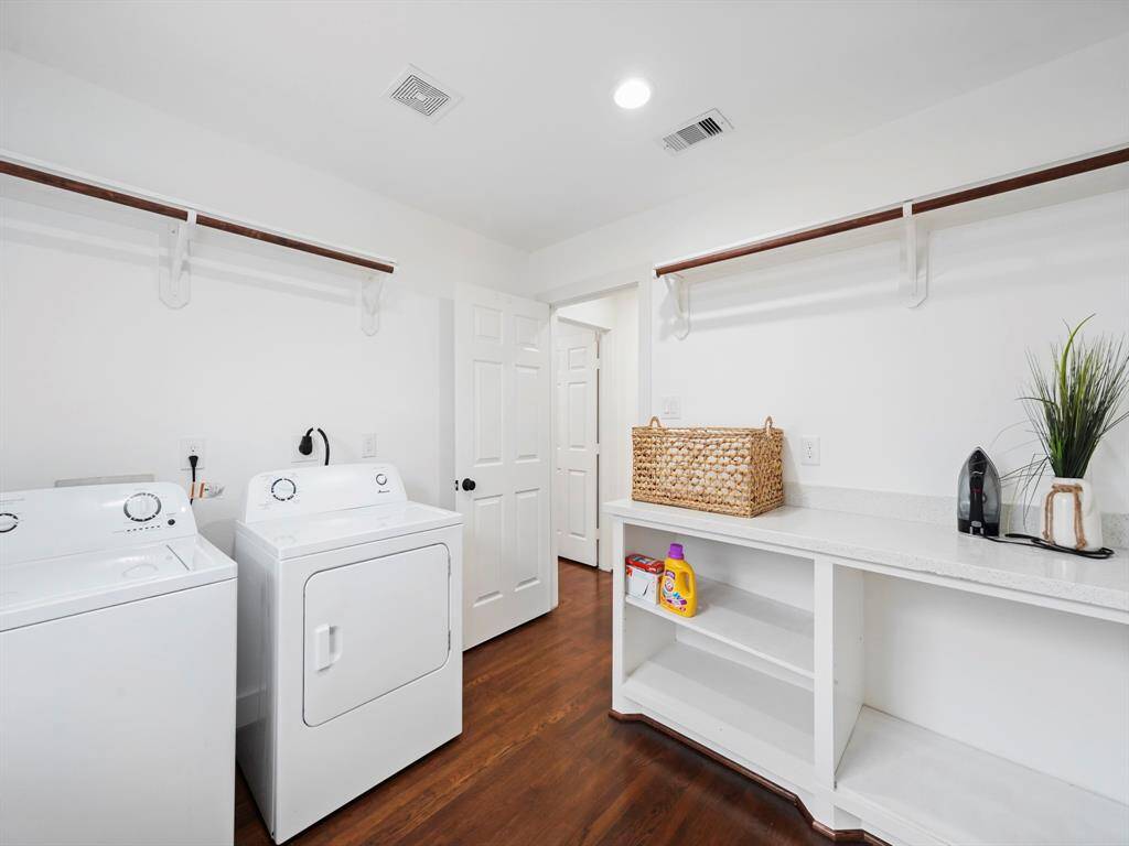 Utility room features built-in storage.
