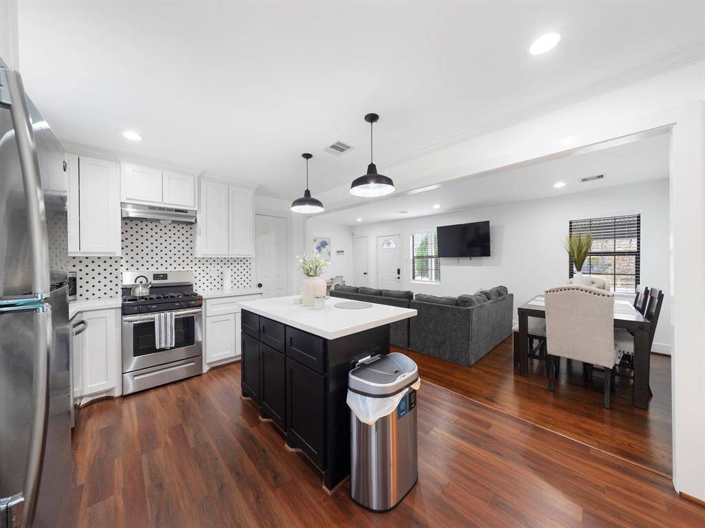 Kitchen is open to the living and dining room.