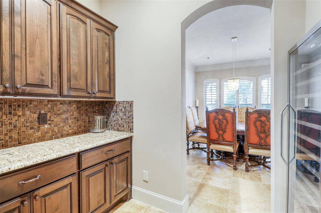 Wine bar conveniently located between the kitchen and dining room.