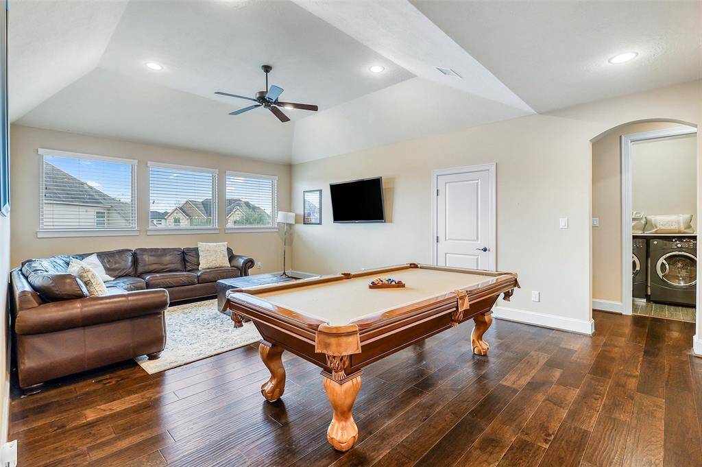 Upstairs game room offering the perfect entertainment space.