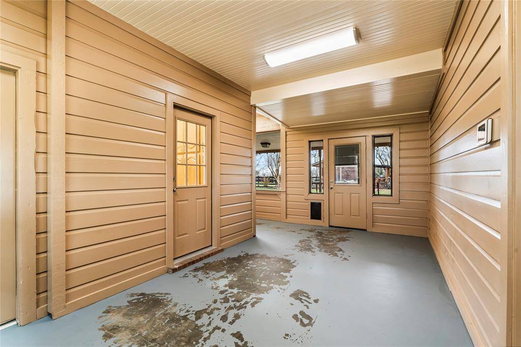 Very expansive back porch has been enclosed to enjoy throughout our Texas summers.