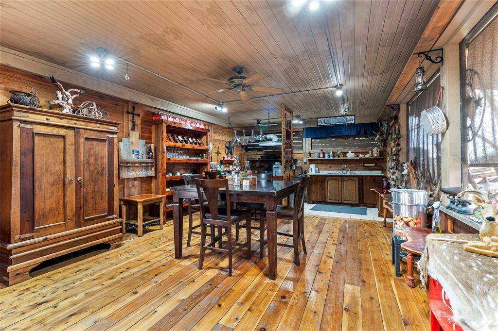 Step inside this BBQ kitchen that's fully equipped to BBQ anything you want.  Lots of space to prepare your food, lounge and store whatever is needed in this space. Made from beautiful cedar.