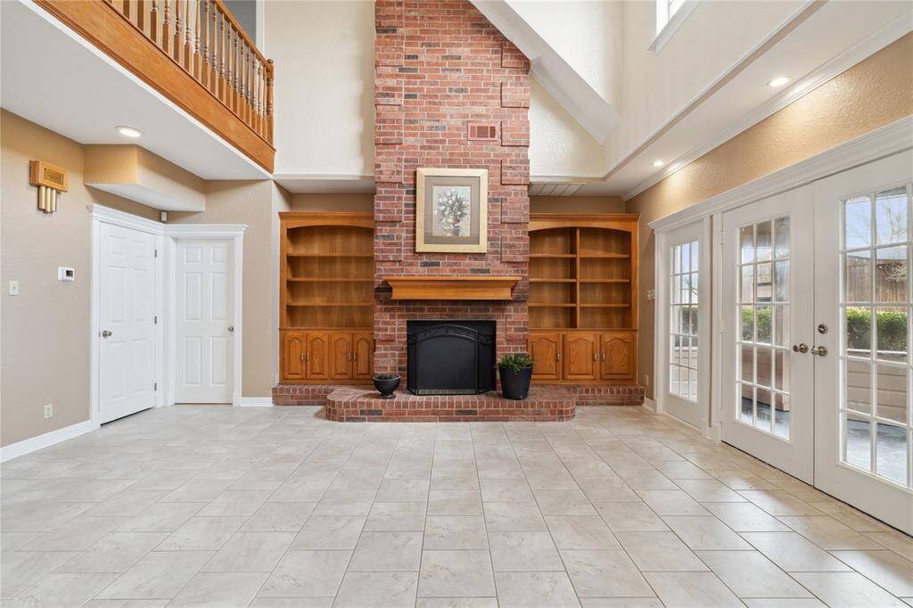 Lots of storage under in these built-ins and well crafted book shelves.