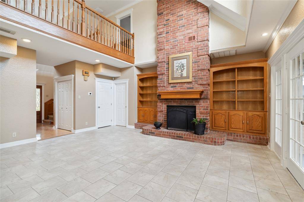 Gorgeous mantle and wood burning fireplace adds to the southern charm of this home. Half bath sits off living room for guests.