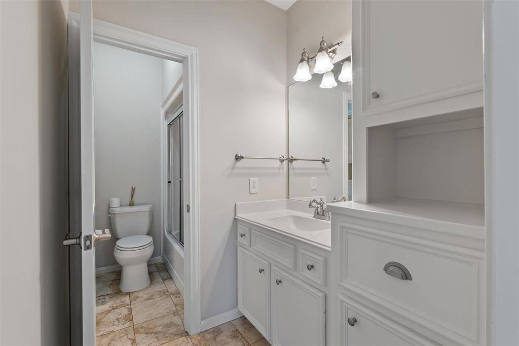The nice-sized guest bathroom is conveniently located for easy access, providing comfort and practicality for your guests.