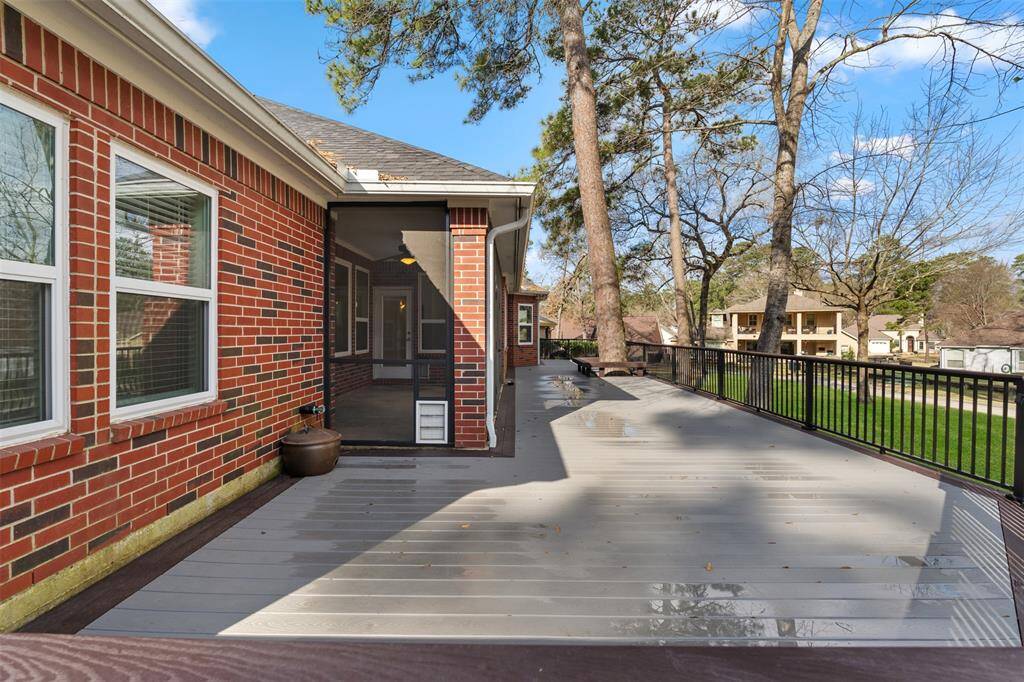 The large new deck, built with Trex material featuring a lifetime warranty, overlooks the beautiful Walden golf course, providing the perfect space for outdoor entertaining