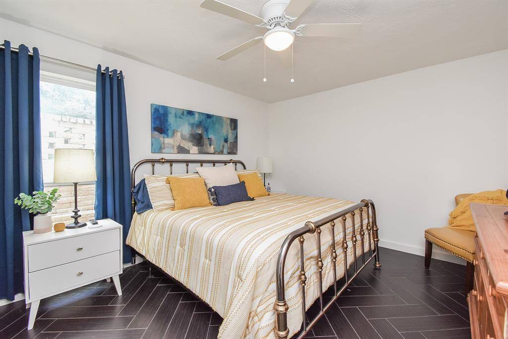 One of the 2 secondary bedrooms on the 1st floor.   No carpet on entire 1st floor