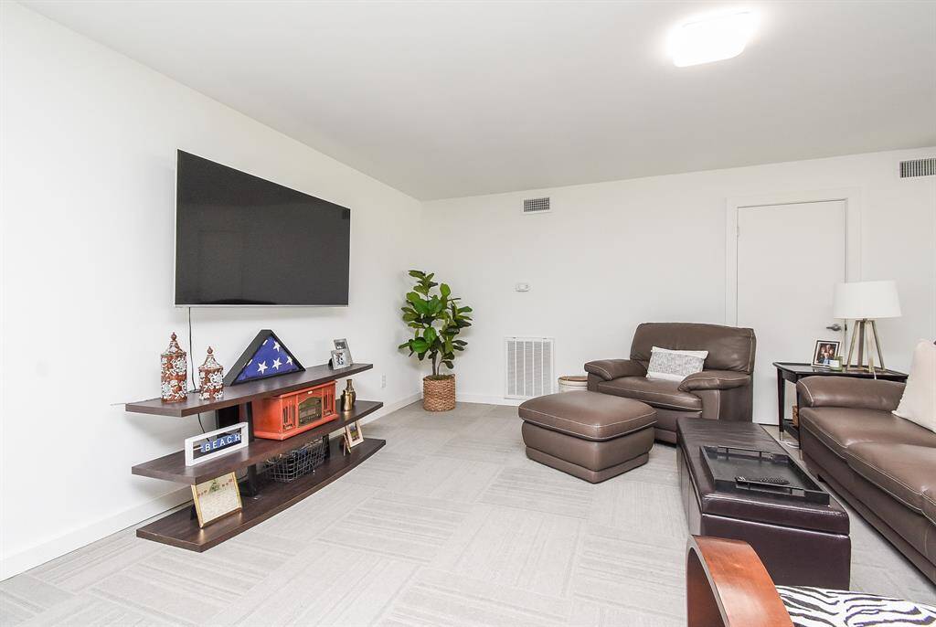 Upstairs Den with carpet tile flooring