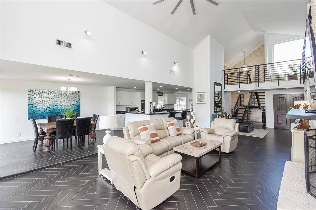 Another view of living area and formal dining area on left. The magnificent kitchen in background that we will visit shortly